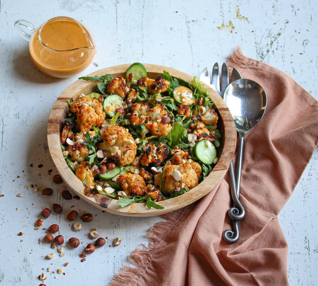 Roasted cauliflower salad with rocket, feta and toasted hazelnuts