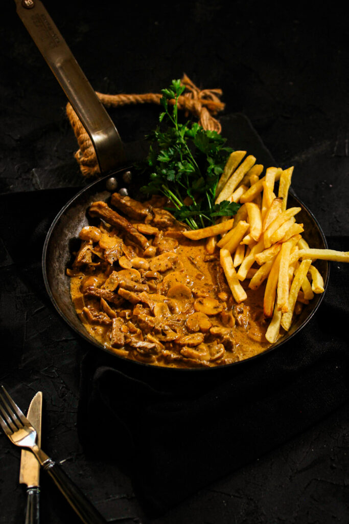 Tender beef strips and mushrooms in a creamy paprika sauce